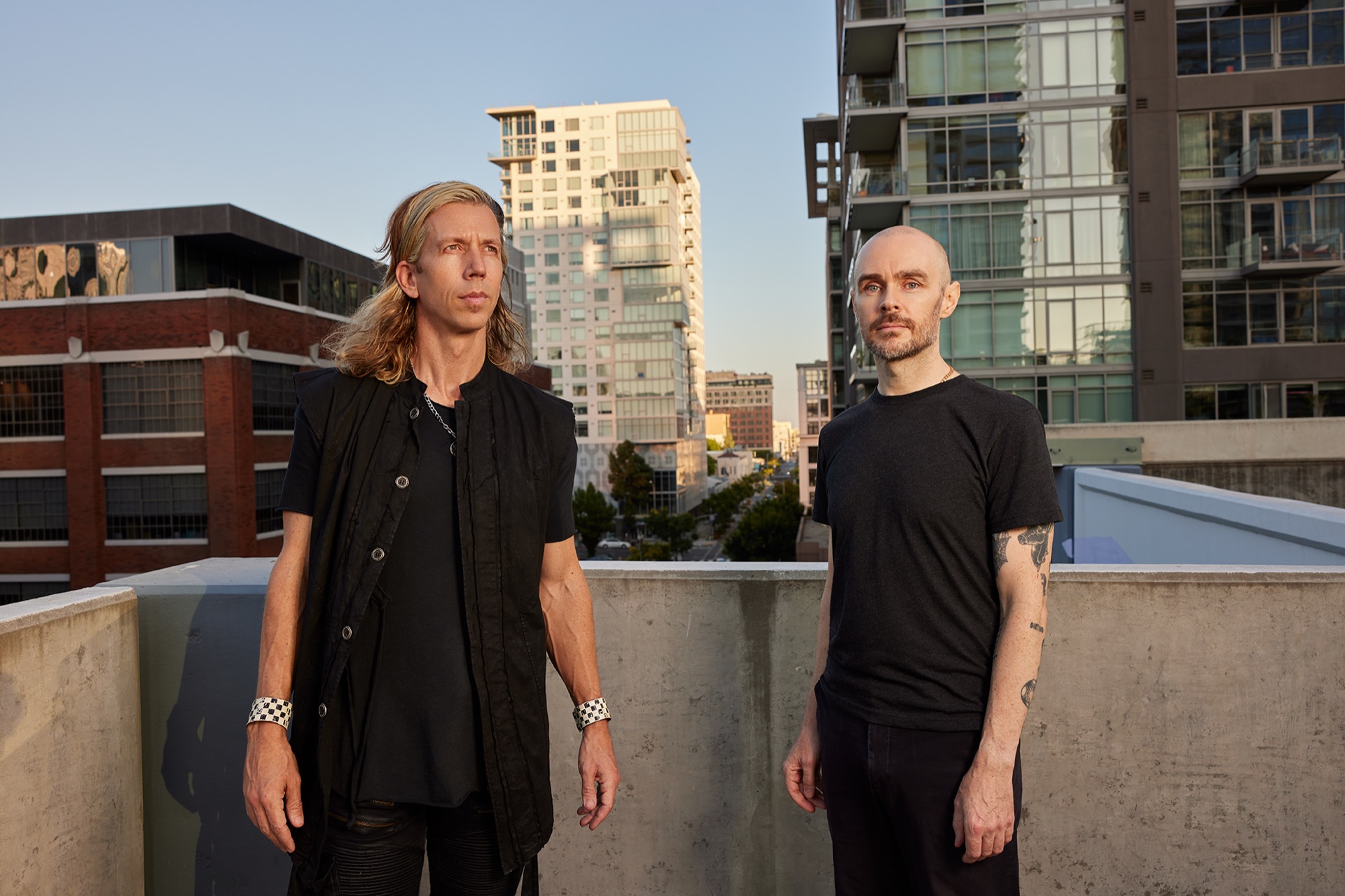 Indiana Bradley standing on a Los Angeles rooftop with Hunter Burgan of AFI
